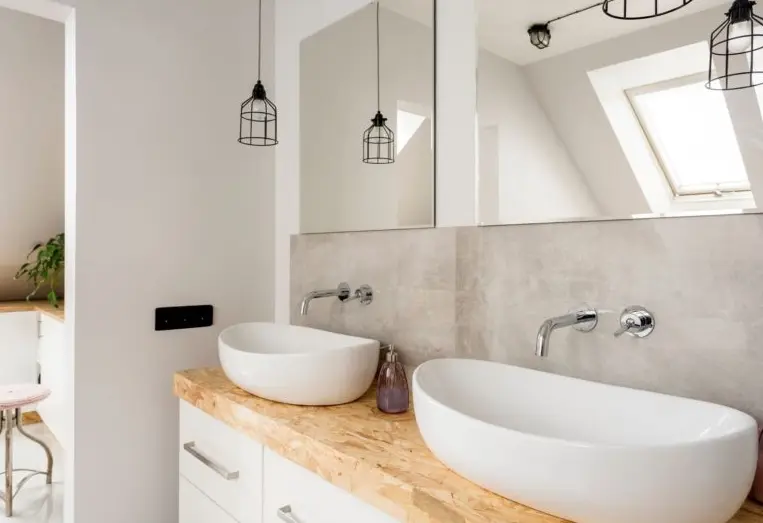 Bathroom tiling in Cardiff with decorative feature wall and double basin unit